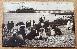 Sunbathers People Children & beach overlooking West Pier Edwardian 1911 Postcard - Foto 1 di 8