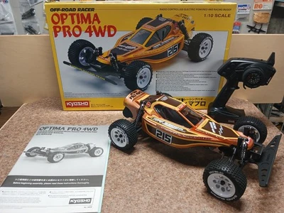 KYOSHO OPTIMA PRO 4WD RACING BUGGY 30620 44000 RTR 2.4GHZ RADIO SET MOTOR ESC - Image 1 of 4