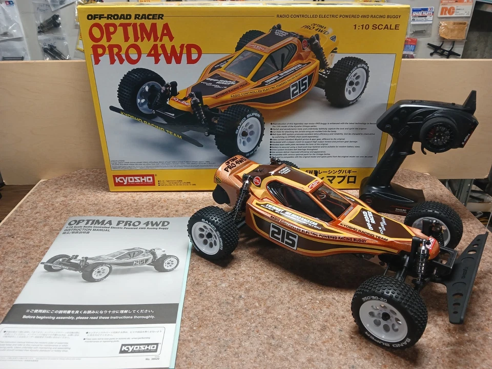KYOSHO OPTIMA PRO 4WD RACING BUGGY 30620 44000 RTR 2.4GHZ RADIO SET MOTOR ESC - Image 1 of 4