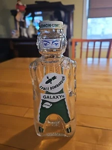 VINTAGE spaceman GALAXY SYRUP SPACE BOMBARDIER GREEN  BOTTLE - Picture 1 of 8