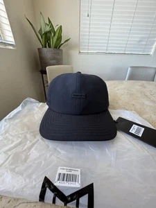 Melin Hydro The Legend Curved Bill Hat Black Classic NWT Size Classic 58 Cm - Picture 1 of 15