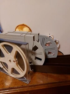 4 BOBINES VIDES POUR FILM SUPER 8 AVEC BOITE......DE 120 M L'UNE - Photo 1/1