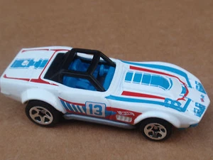 Corvette Racer 86/250 Night Burnerz 2016 69 Hot Wheels suelto blanco - Imagen 1 de 1