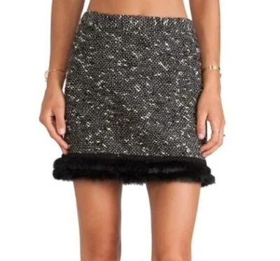 Falda de tweed Nanette Lepore dobladillo de piel de conejo talla 12 negra crema por encima de la rodilla Foto 1 de 4