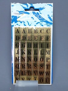 LQ206 Z DESIGN 3715 LETTRES AUTOCOLLANTES A à Z NOIR FOND DORE - Imagen 1 de 2