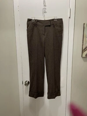 Pantalones de mujer Studio 1940. Color marrón. Talla 12. Pantalones con dobladillo con puños. Cremallera frontal. Foto 1 de 4