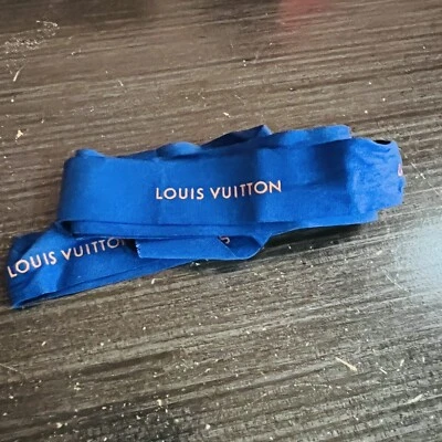 Louis Vuitton Logo Satin Ribbon 54” Length Blue With Orange Logo 1.10” Wide - Image 1 of 3
