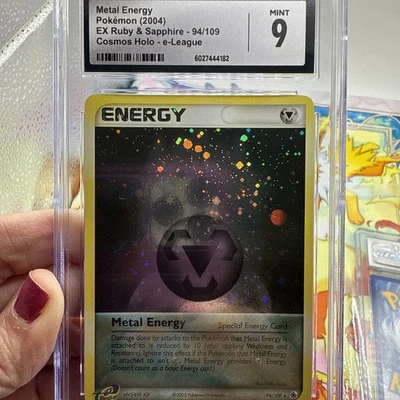 2004 Metal Energy Pokem Ex Ruby & Sap E League 94/109 Cosmos Holo CGC 9 SWIRL!! - Image 1 of 4