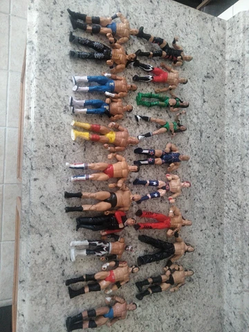 WWE action figures Mattel Jakks Harley Race Hogan Jim Ross Kurt Angle Big Show Cover