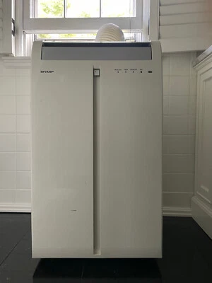 SHARP CV-P09FX ELÉCTRICO PORTÁTIL SUELO RODANTE - AIRE ACONDICIONADO VENTANA CON MANDO A DISTANCIA Foto 1 de 4