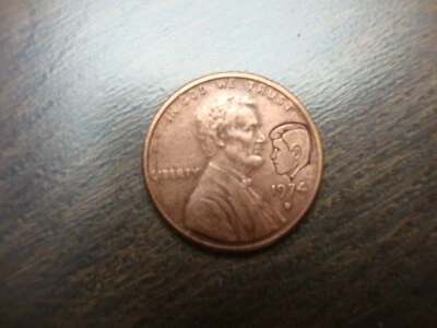 1974 D LINCOLN PENNY  STAMPED WITH JOHN F.  KENNEDY IMAGES - Image 1 of 4