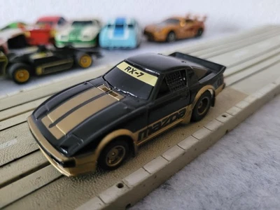 Faller AMS Mazda RX7 Nr. 5677 für Superloop-Bahnen m Tyco Motor hohe Magnetkraft - Bild 1 von 3