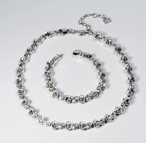Collar y pulsera de adorno semiforma de tono plateado transparente de estrás múltiple - Imagen 1 de 7