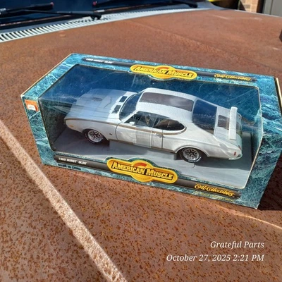 NiB ERTL AMERICAN MUSCLE 1969 HURST OLDS масштаб 1:18 литая - Изображение 1 из 3