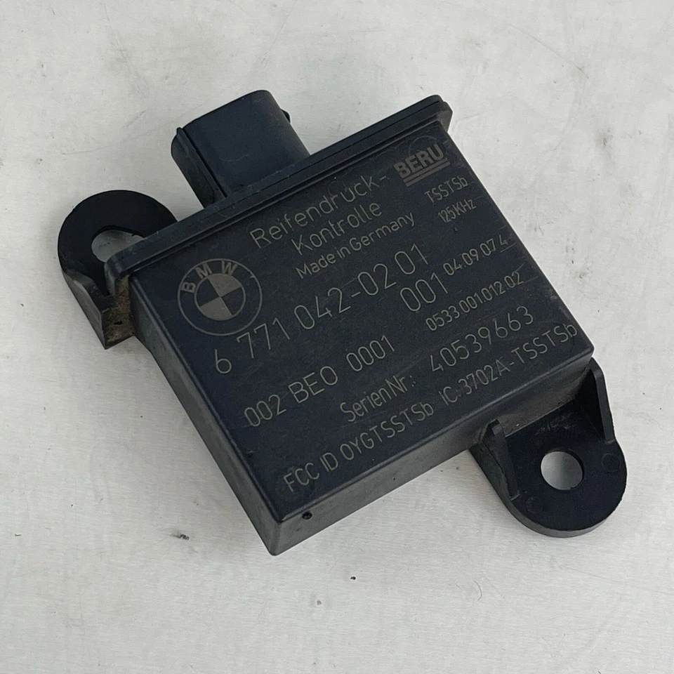Sensor monitor de presión de neumáticos TPMS BMW 650i 745i 535i 525i 528i 328i OEM 6771042 Foto 1 de 4