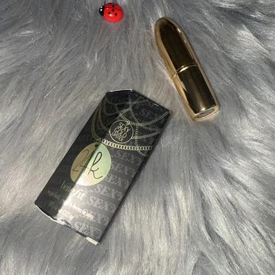 Lápiz labial dorado sexy 24 K Benefit raro  Foto 1 de 4