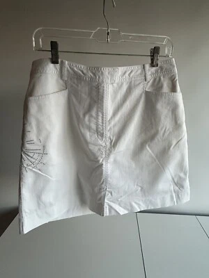 Pantalones cortos de golf Nike para mujer blancos con patrón bordado plateado talla L Foto 1 de 4