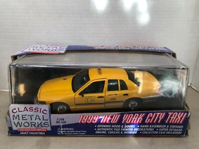 1/24 CLASSIC METAL WORKS 1999 FORD CROWN VICTORIA NEW YORK CITY TAXI YELLOW - Image 1 of 3