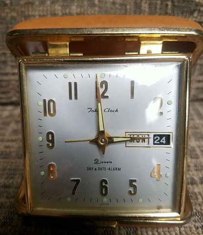 Vtg Wind Up Day/Date Alarm Travel Tokyo CLOCK, Tan Folding Case, 2 jewels AS IS Cover