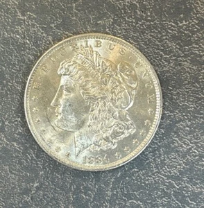 1884-o Morgan Silver Dollar BRILLIANT UNCIRCULATED 90% Silver Morgan Dollar - Picture 1 of 9