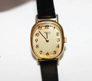 Reloj de pulsera vintage para mujer Seikoo tono dorado correa negra espalda de acero - Imagen 1 de 7