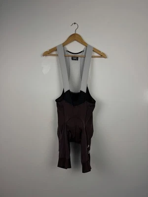 Culotte con tirantes Pas Normal Studios PNS Ciclismo Velo Mecanismo Marrón Equipo Profesional Talla L Foto 1 de 4