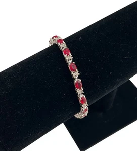 Avon 7.5” Red Ruby Colored Rhinestone Silver Tone Tennis Bracelet Vintage - Picture 1 of 8