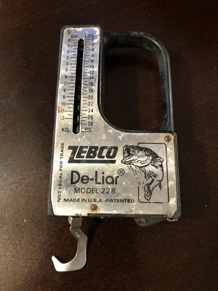 Escala/cinta métrica de pesca vintage Zebco modelo 228 De-Liar Foto 1 de 1