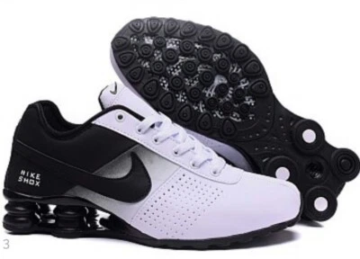 LIMITADO Lo último Nuevo Hombres Mujeres Blanco y Negro Nike Shox Entrega Zapatos para Correr Personalizados Foto 1 de 4