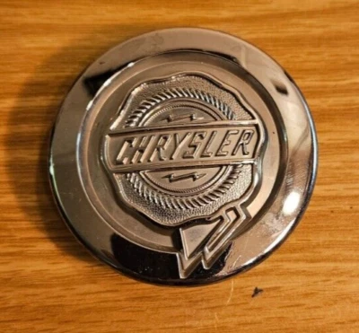 Chrysler Sebring 2003-2008 OEM rueda tapa central plateada 04895899ab Foto 1 de 4