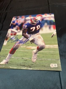 BUFFALO BILLS BRUCE SMITH #78 SIGNED 11X14 PHOTO HOF 2009 Attack Pose Beckett - Picture 1 of 1