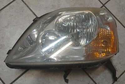 05 06 07 Conjunto de faros izquierdos Ford Five Hundred OEM Foto 1 de 4