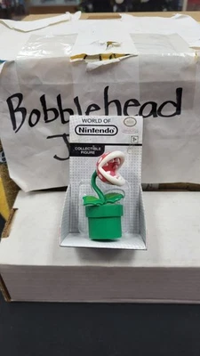 NUEVO EN CAJA 2015 2.5" FIGURA PLANTA PIRAÑA SUPER MARIO BROS WORLD OF NINTENDO JAKKS Foto 1 de 4