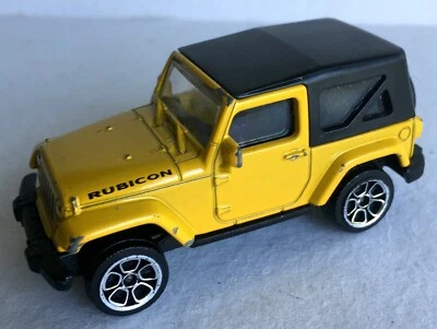 Majorette ref 224A Jeep Wrangler Rubicon jaune 1/60ème - Photo 1/3