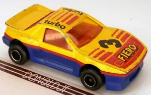 Coche deportivo Majorette #206 Pontiac Fiero de fuselaje ancho amarillo/rojo/azul escala 1:55 - Imagen 1 de 2