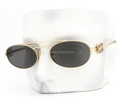 Gafas de sol Miu Miu SMU 54Z ZVN-08Z brillantes doradas pálidas gris oscuro con estuche expositor Foto 1 de 4