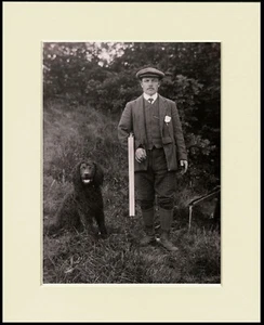 IRISH WATER SPANIEL MAN WITH HIS DOG AND GUN PHOTO PRINT MOUNTED READY TO FRAME - Picture 1 of 1