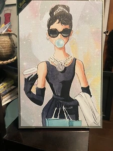 Oliver by Oliver Gal Audrey with Bubblegum wrapped Canvas Breakfast at Tiffany’s - Picture 1 of 3