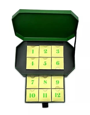 Collar/dijes de cadena calendario de adviento Aqua 12 días de joyas oro 14K P $200 Foto 1 de 4