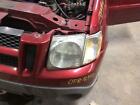 Used Left Headlight Assembly fits: 2003 Ford Explorer 2 Dr Sport package L. Left