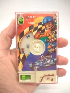VTG Pocket Racer Hand Held Toy Wind Up Racing Car Game Grand Prix Nostalgia - Picture 1 of 2