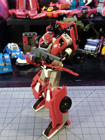 Transformers Generations GDO Deluxe Class SWERVE Autobot Action Figure 2012 Cover
