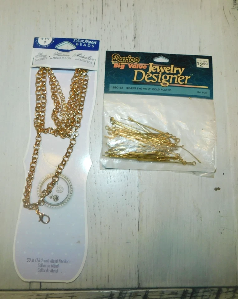 LOTE DE ALFILERES DE OJO DE LATÓN DARICE Y COLLAR DE METAL LUNA AZUL Foto 1 de 1