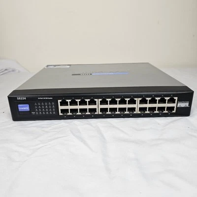 Cisco Linksys SR224 10/100 Unmanaged Ethernet Switch 24 Port with power cord - Image 1 of 4