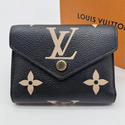 Louis Vuitton Portefeuille Victorine Monogram Empreinte Fold Wallet - Image 1 of 4