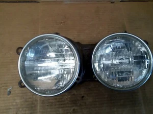 1988 BMW 528E BASE, GREEN, DUAL LEFT DRIVER HEADLAMP/ LIGHT - Picture 1 of 4