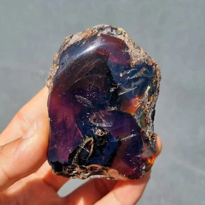 61 gr Ambra Sumatra originale grezza bluastra nera - Ambra Sumatra mezza lucida - Foto 1 di 6