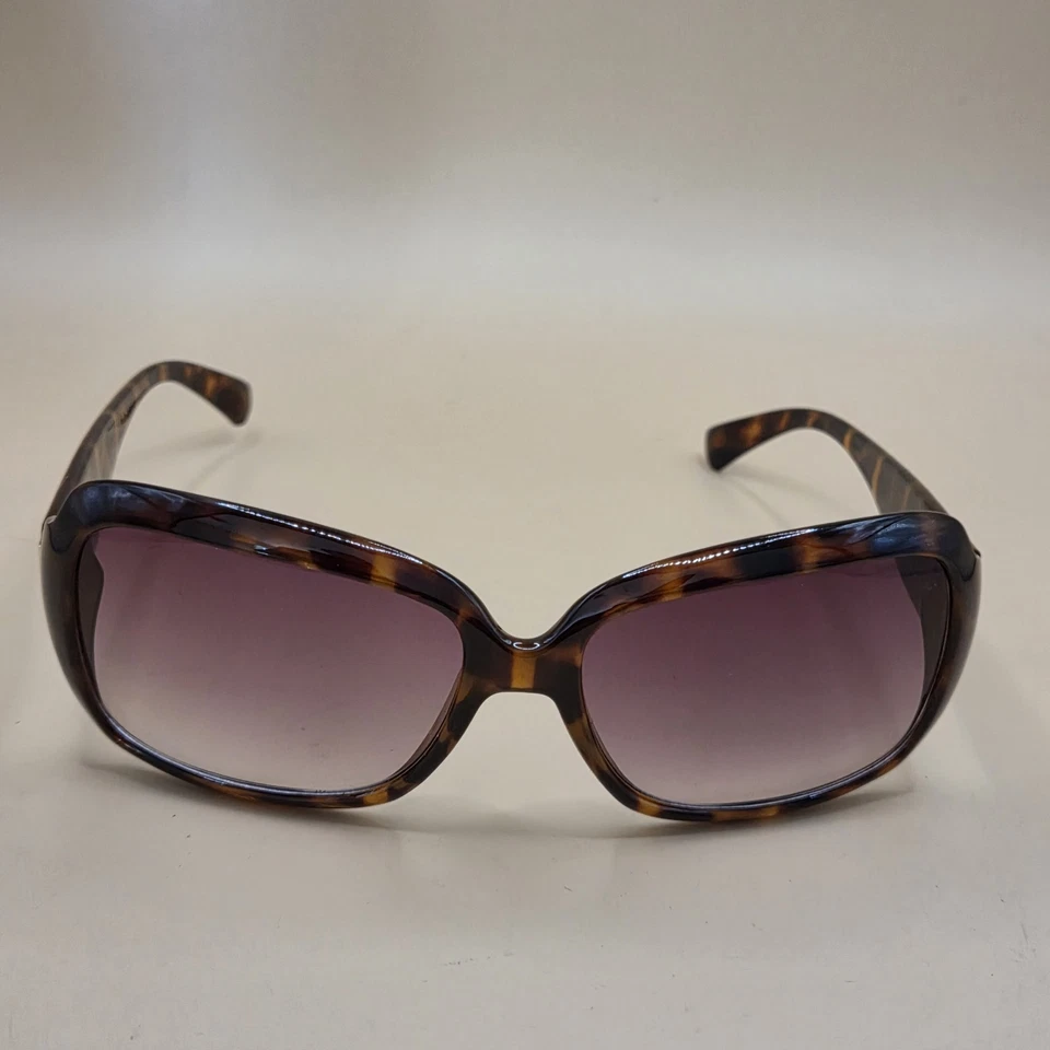 Gafas de sol vintage Liz Claiborne ovaladas púrpuras lentes doradas tortuga marrón fin de semana  Foto 1 de 4