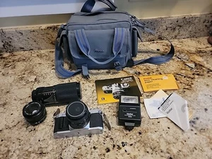 Canon AV-1 35mm SLR Camera w/3 Total Lenses, Flash, Bag. See Pictures. Working - Picture 1 of 13