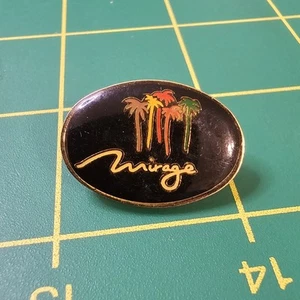 Spilla da bavero vintage logo palme Mirage hotel e casinò B17 - Foto 1 di 2